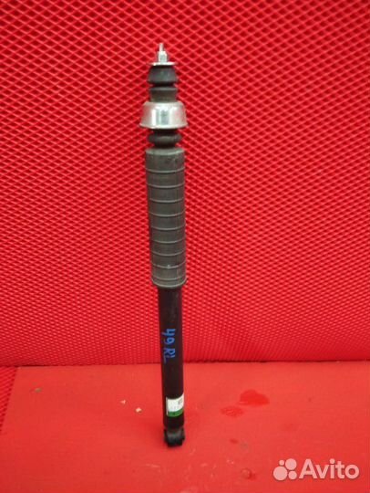 Амортизатор задний левый Nissan Note HE12