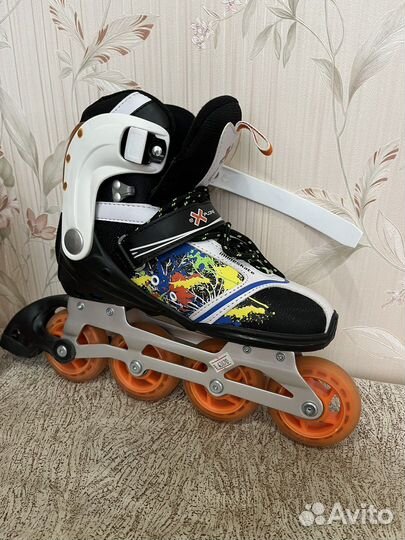 Роликовые коньки