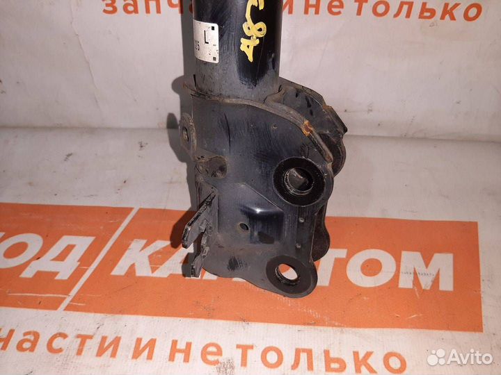 Стойка амортизатора передняя левая Mazda CX-5 KE