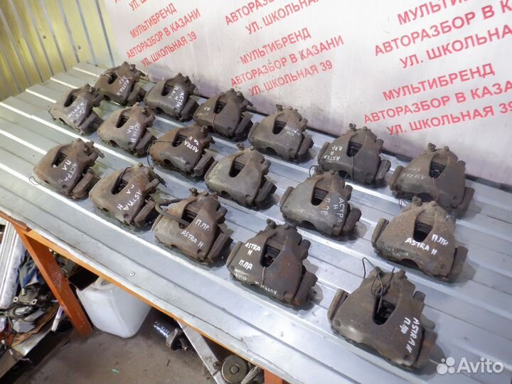 Суппорта тормозные передние Опель Астра Н