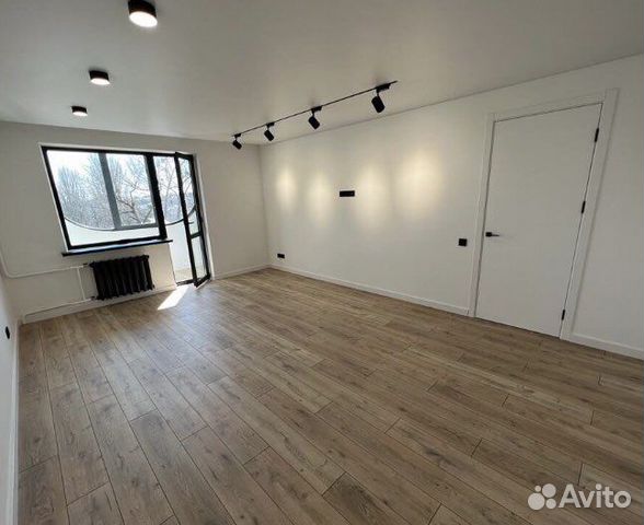 Шпатлевка стен и потолков