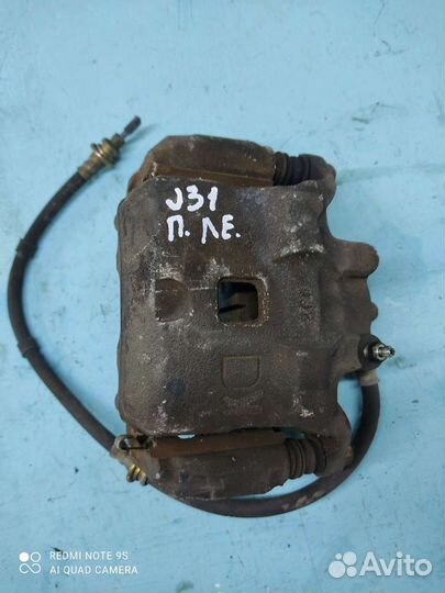 Суппорт передний левый Nissan Teana j31