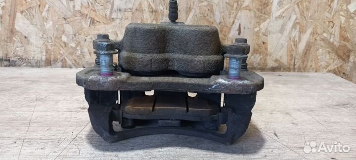 Суппорт тормозной передний левый Opel Antara