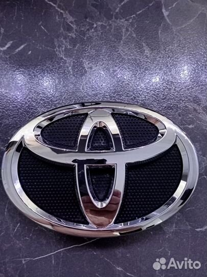 Эмблема Тoyota