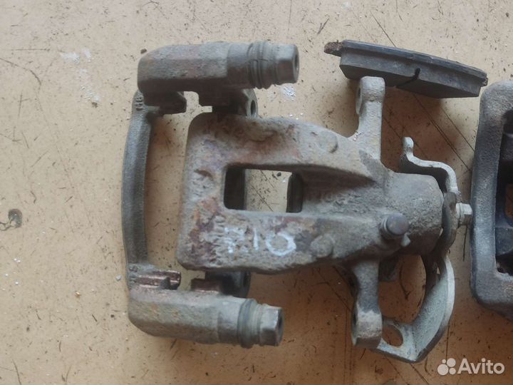 Суппорт тормозной задний Kia RIO 3 Solaris