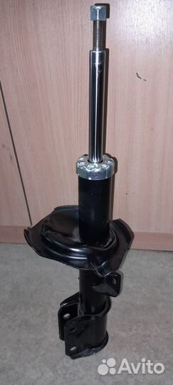 Амортизатор передний левый Suzuki SX4(2006-2012г.в