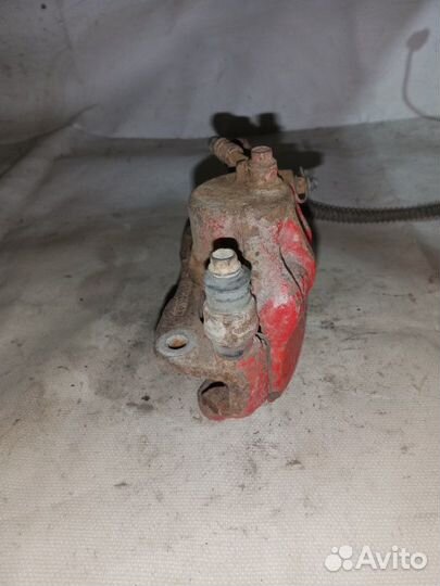 Суппорт тормозной передний левый Hyundai Accent