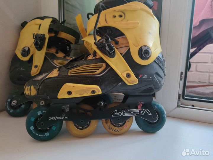 Роликовые коньки