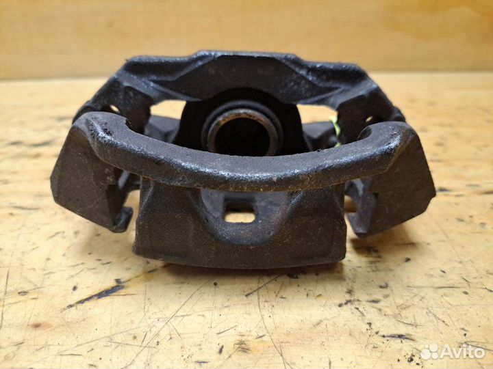 Суппорт задний левый Nissan Laurel HC35 RB20DE