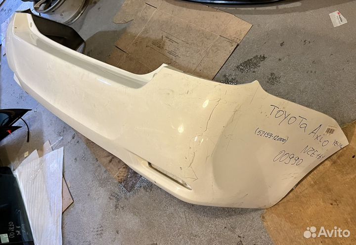 Бампер задний Toyota Axio NZE161