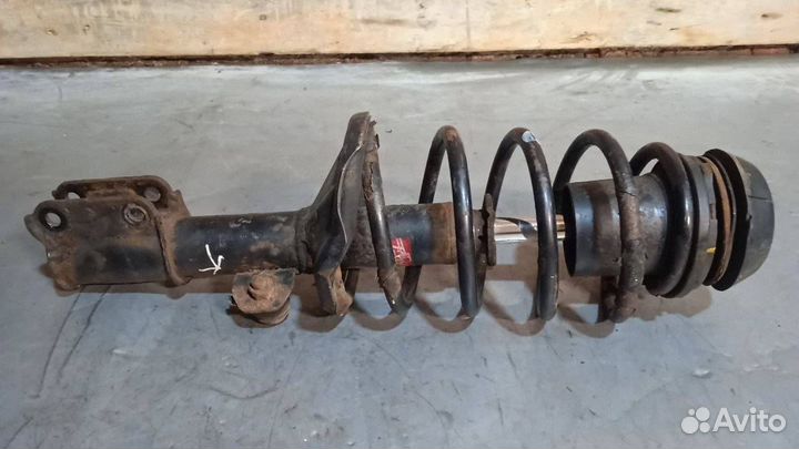 Стойка амортизатора передняя левая Chevrolet