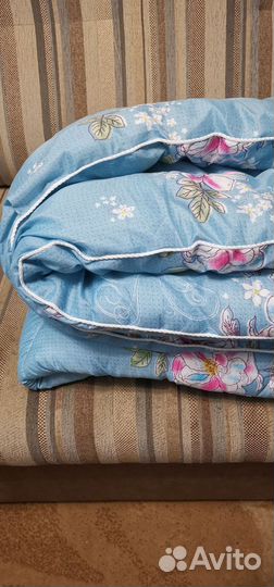 Новое одеяло в упаковке