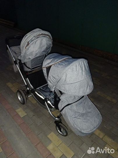 Двойная детская коляска