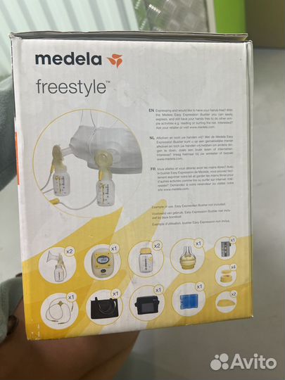 Молокоотсос двойной medela freestyle double новый