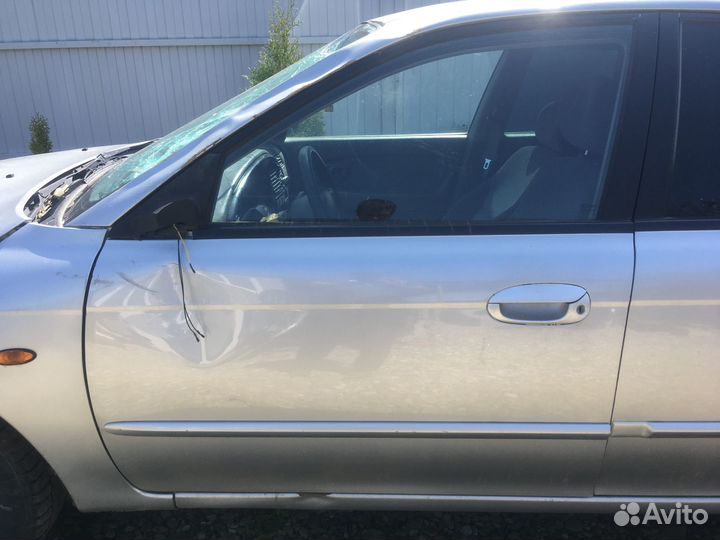 Дверь передняя kia spectra