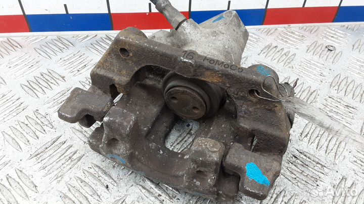 Суппорт тормозной задний правый на Ford Focus 2