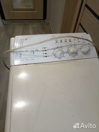 Стиральная машинка с вертикальной загрузкой