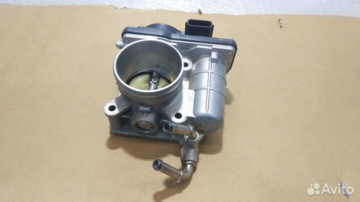 Дросельная заслонка Nissan Sera 52601