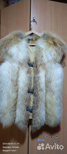 Жилетка меховая женская