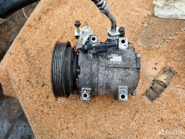 Компрессор кондиционера Ссанг Енг Актион Спорт