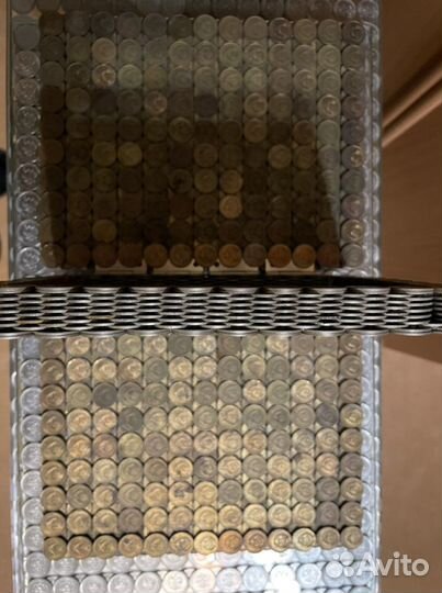 Книга из монет эпохи СССР в количестве около 69 ст