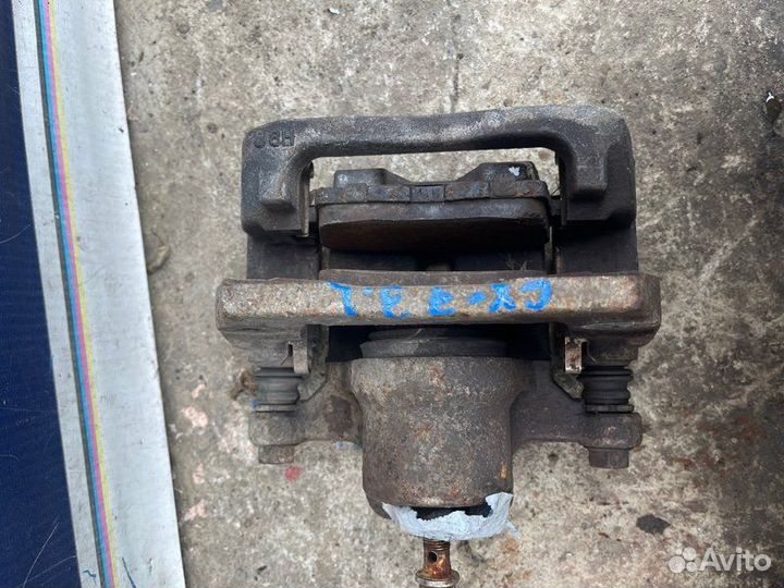 Суппорт задний левый Mazda Cx-7