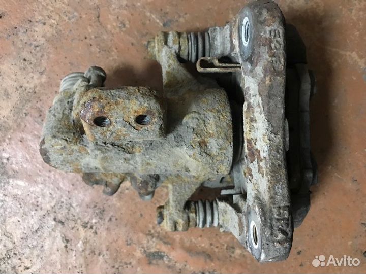 Суппорт тормозной задний правый Honda Civic FD1