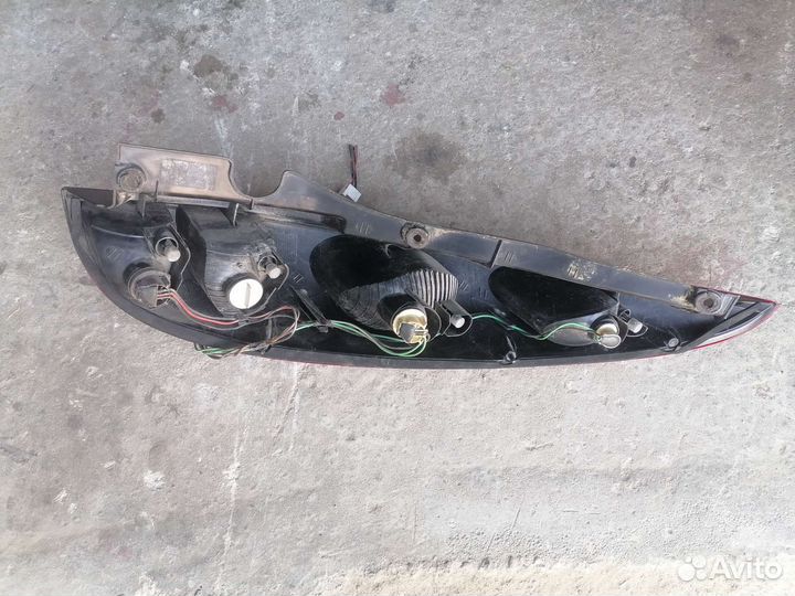 Фонарь задний Ниссан Альмера Тино