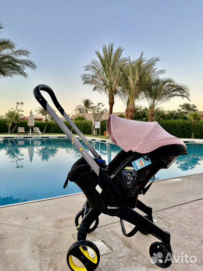 Коляска автокресло doona с базой isofix
