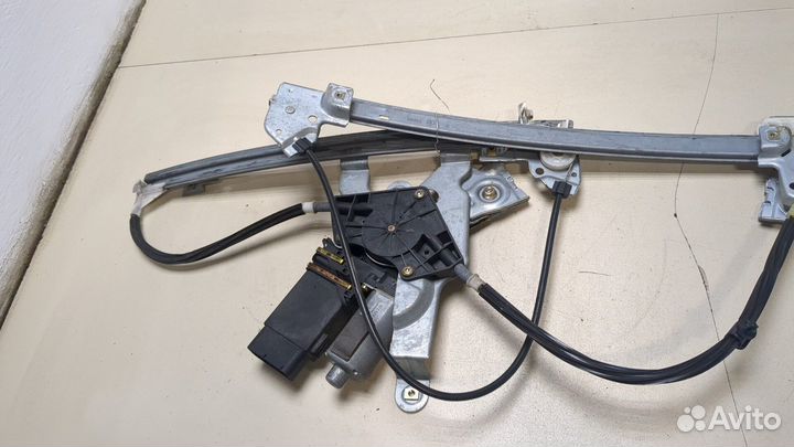 Стеклоподъемник электрический левый передний Skoda Octavia Tour