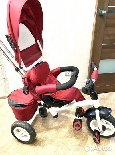 Трехколесный велосипед с ручкой