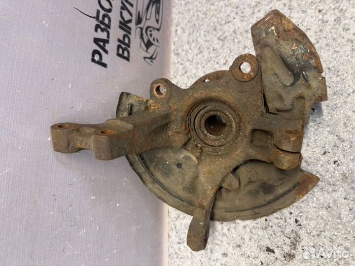 Кулак поворотный передний левый Nissan Almera G15