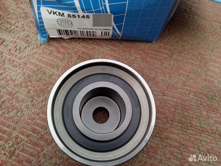 Натяжной ролик ремня грм