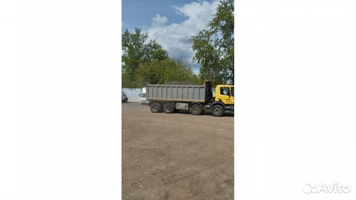 Водитель самосвала Scania