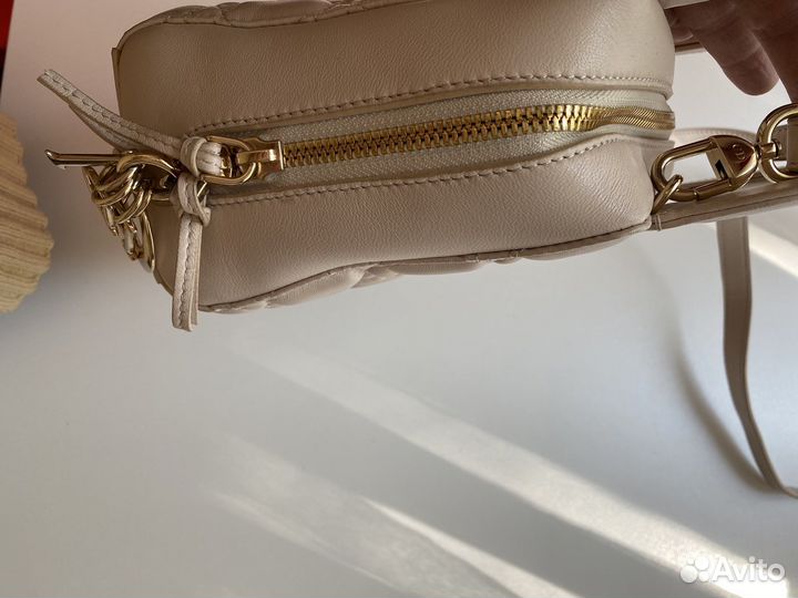 Маленькая сумочка с короткими и длинной ручкой