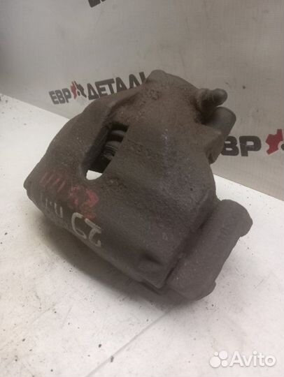 Суппорт тормозной передний правый Volkswagen