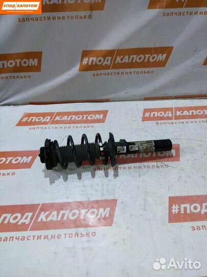 Стойка амортизатора передняя левая Volkswagen