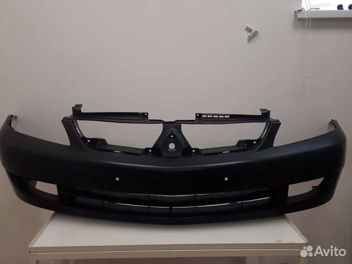 Бампер передний Mitsubishi lancer 9