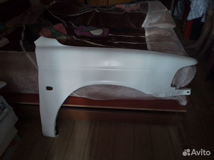 Крыло Митсубиси Паджеро Спорт