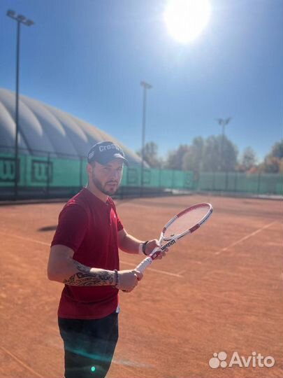 Тренер по большому теннису
