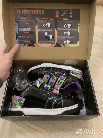 Кроссовки роликовые