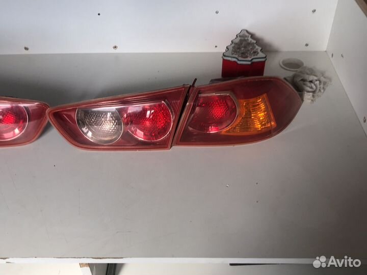 Фары задние ланцер 10