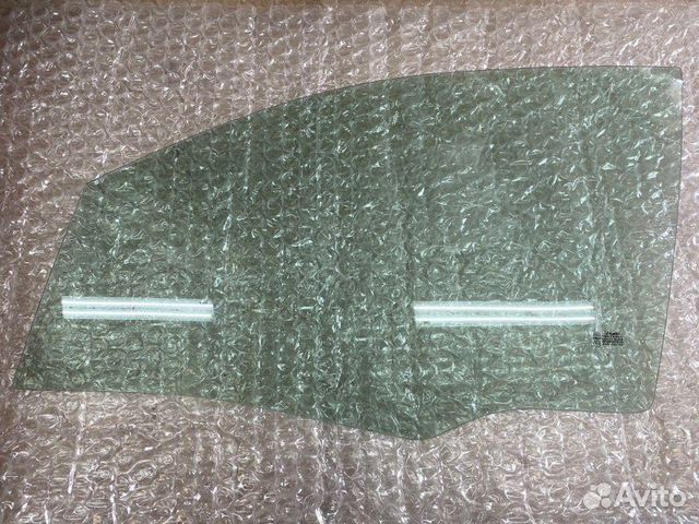 Стекло двери переднее левое Suzuki Aerio 2001