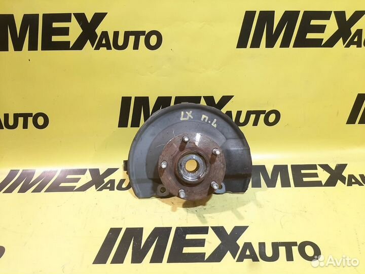 Кулак поворотный левый Mitsubishi Lancer X