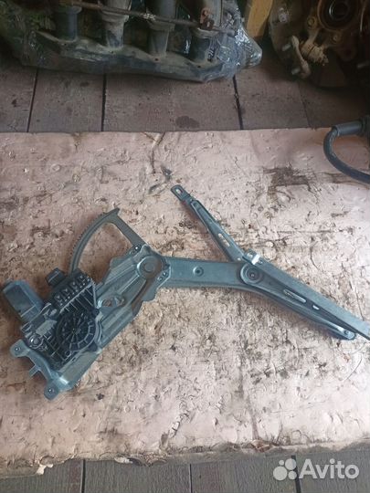 Стеклоподъемник передний левый Opel Zafira B