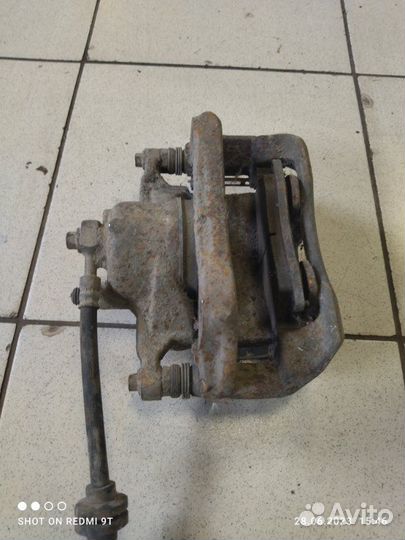 Суппорт тормозной передний левый Chevrolet Cruze