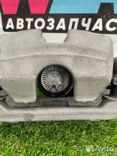 Суппорт тормозной задний правый Tesla Model Y 2021