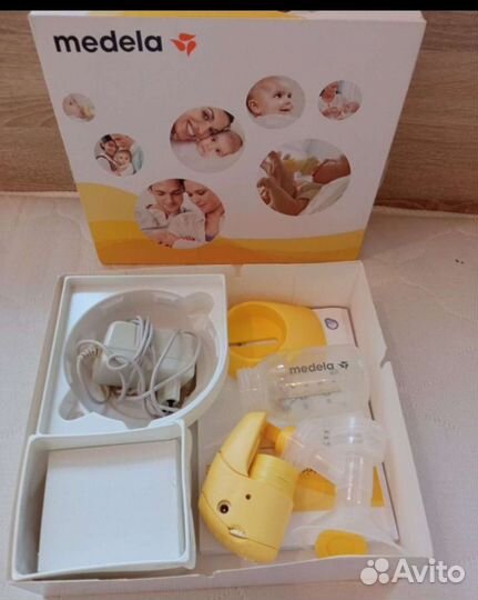 Молокоотсос medela электрический