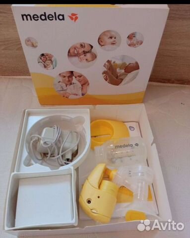 Молокоотсос medela электрический