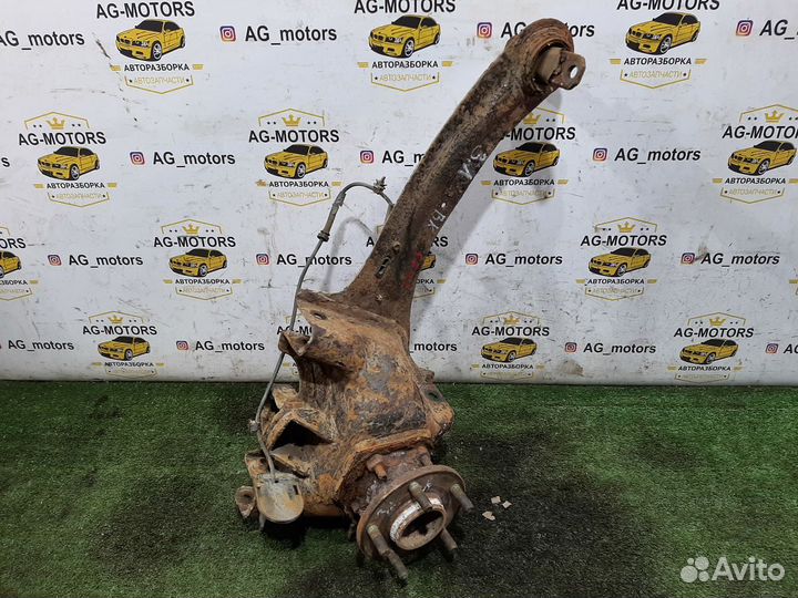 Кулак задний левый Mazda 3 BK седан